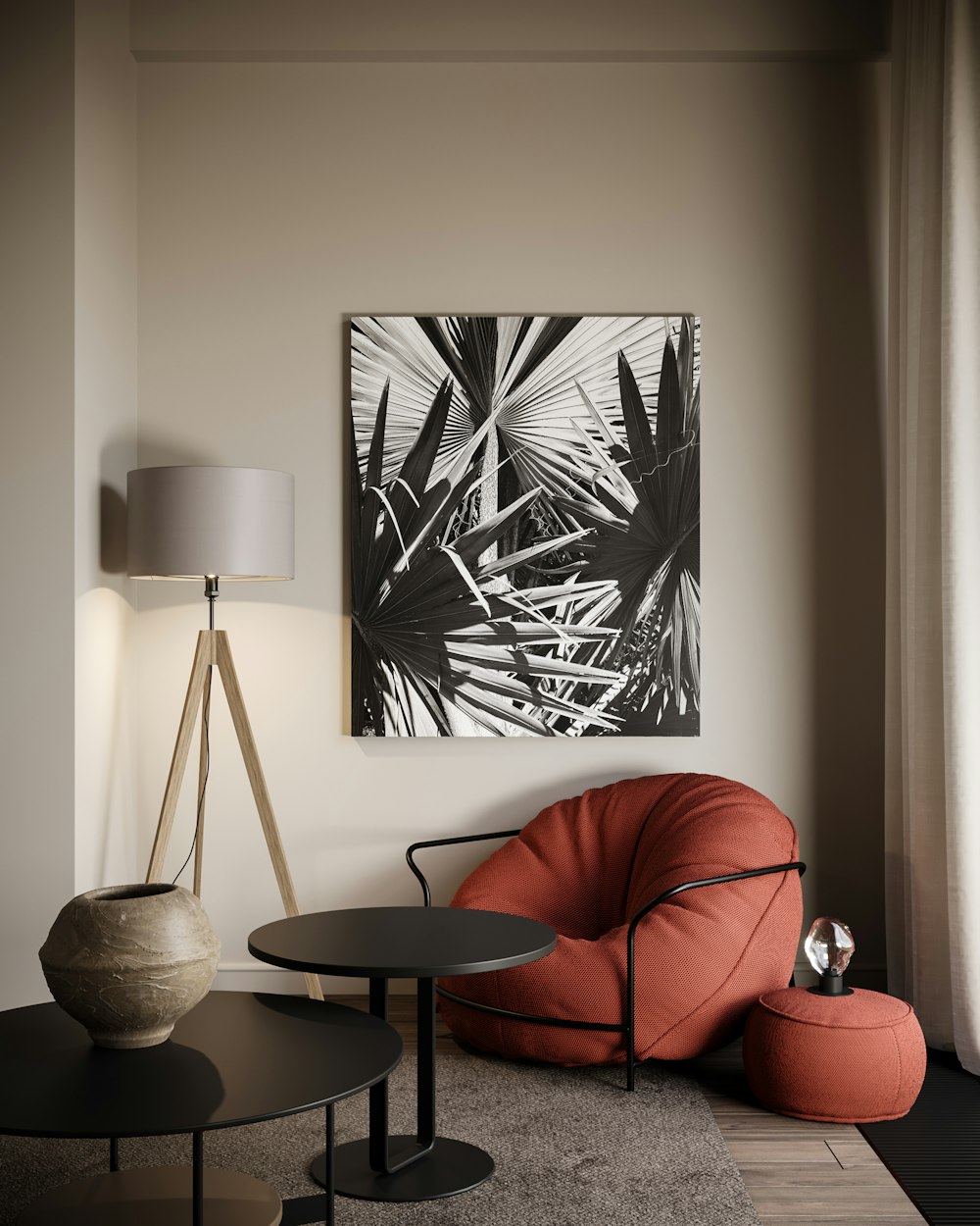 a living room with a red chair and a black table