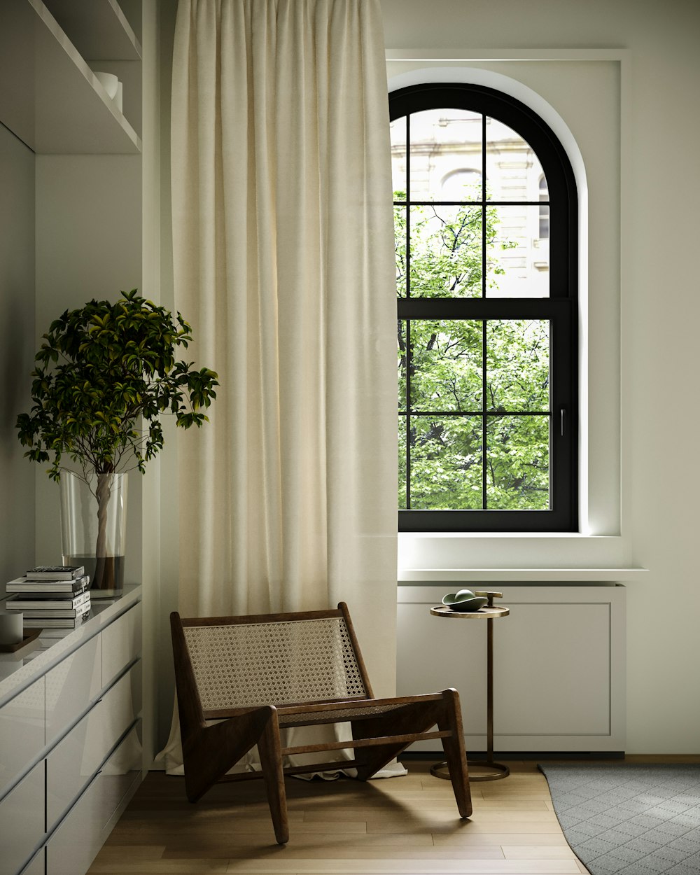 a chair sitting in front of a window in a room