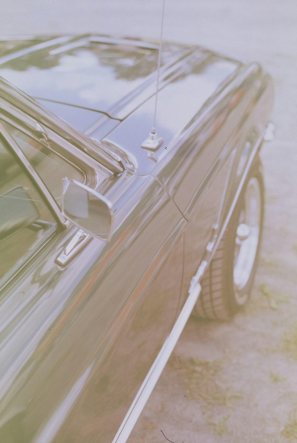 a close up of a car parked in a parking lot