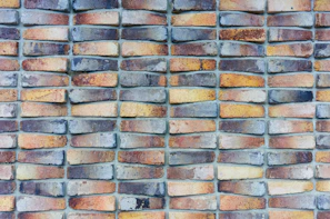 Bricks arranged in a pattern highlighting their rich, earthy tones