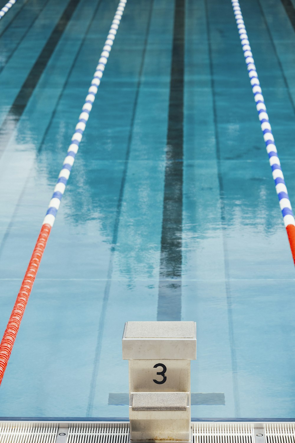 a swimming pool with a number three on the side of it