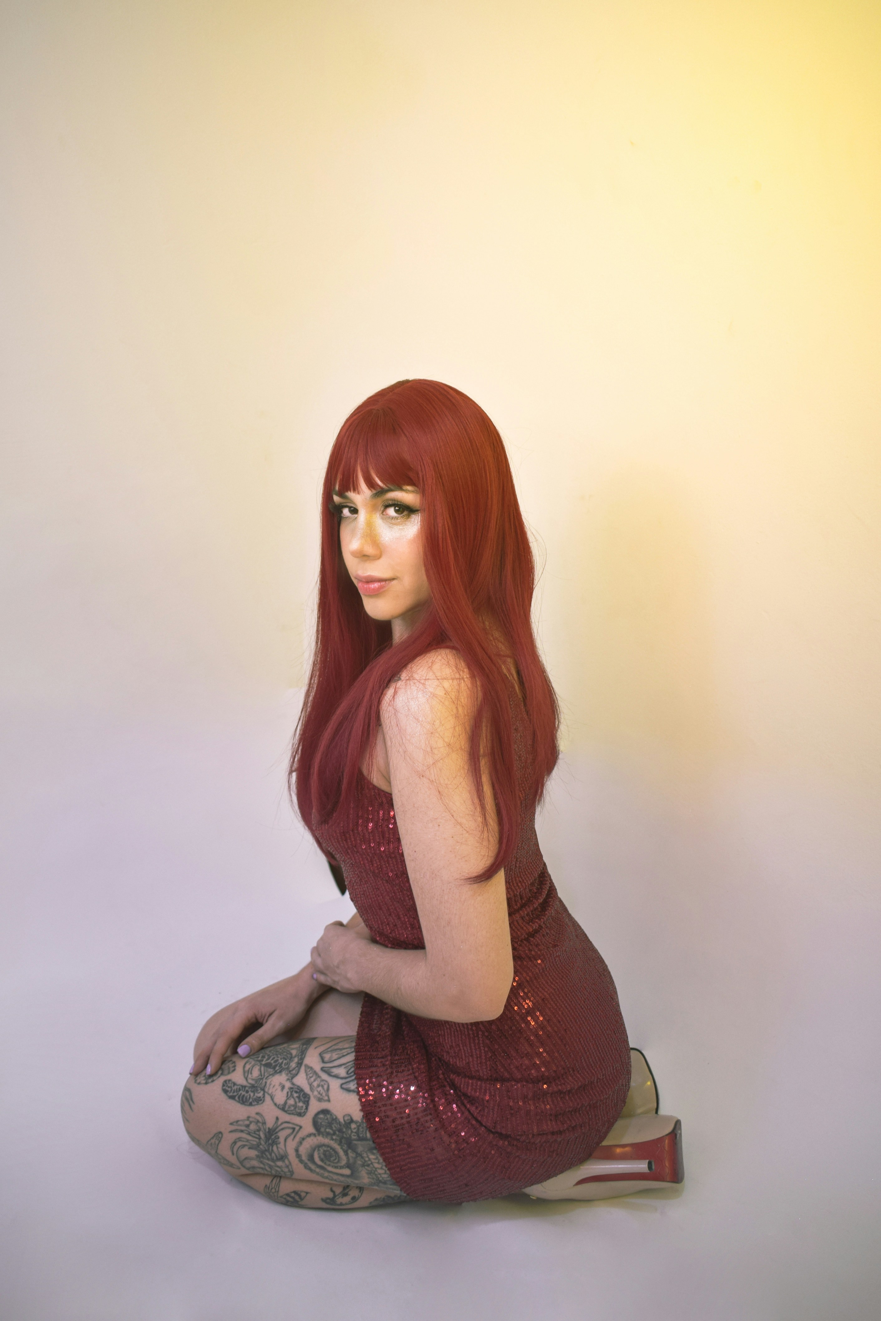 a woman with red raw hair