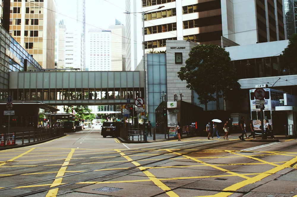 a city street with a train on the tracks