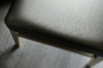A close-up of a comfortable office chair with premium fabric.