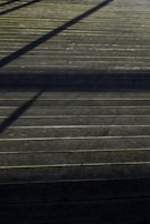 Wooden deck beautifully restored, showing clean wood grain and no signs of dirt.