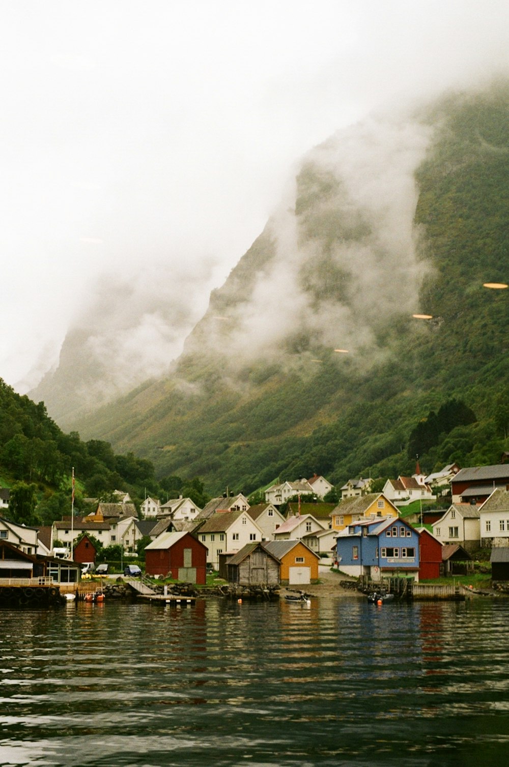 a body of water with a bunch of houses on it