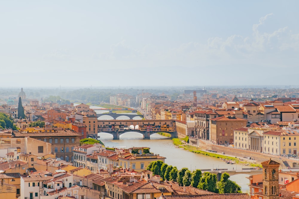 a view of a bridge over a river in a city