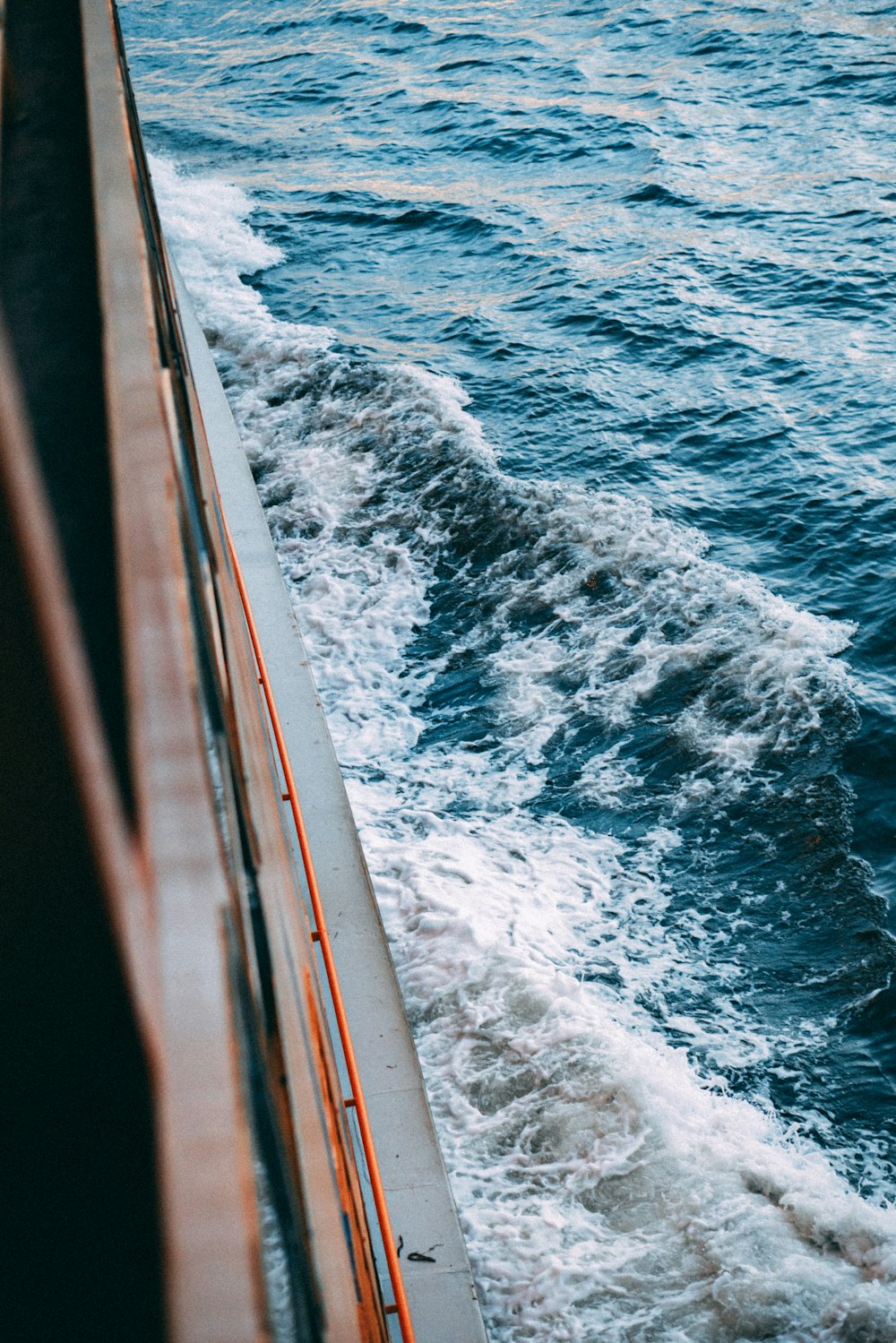 a view of the back of a boat in the water