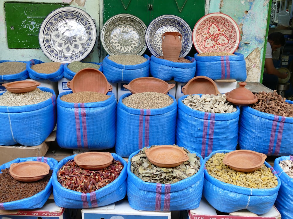 a bunch of bags filled with different types of food