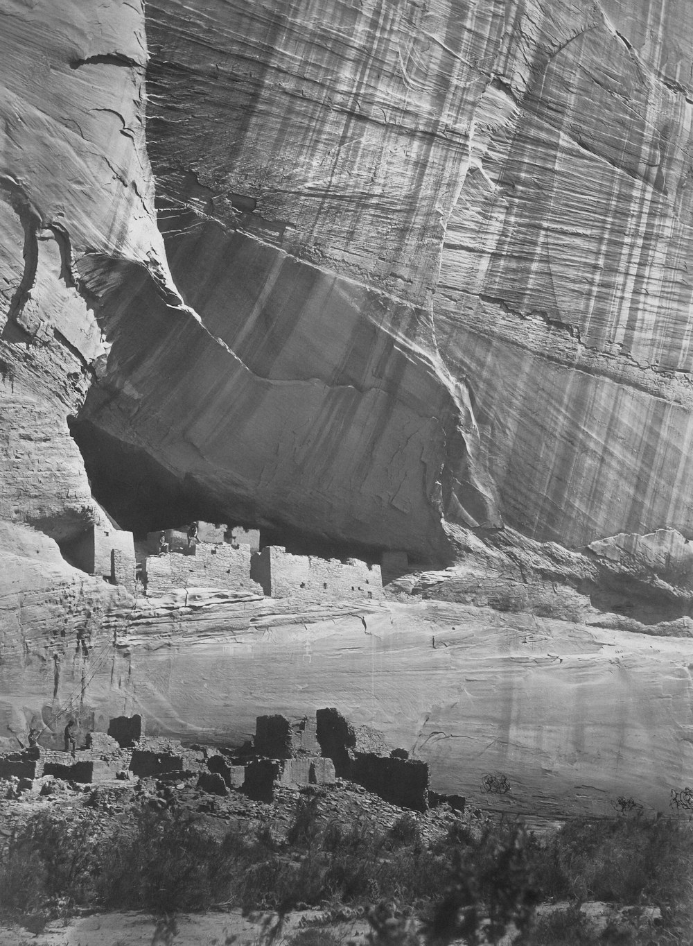 a black and white photo of a cliff