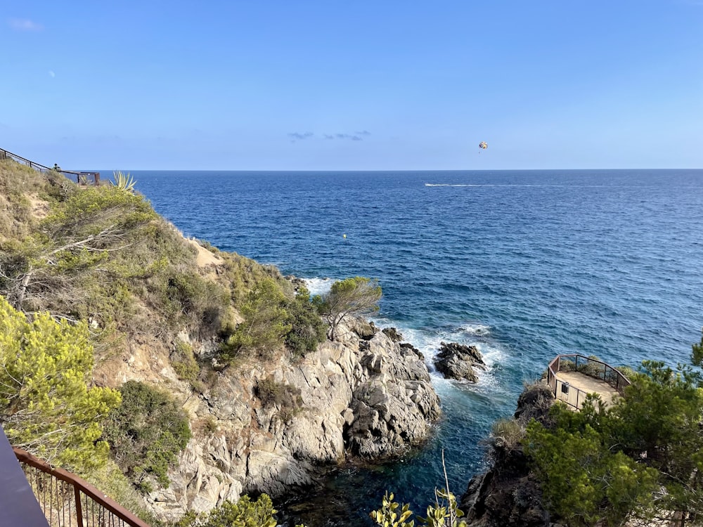 a view of the ocean from a cliff