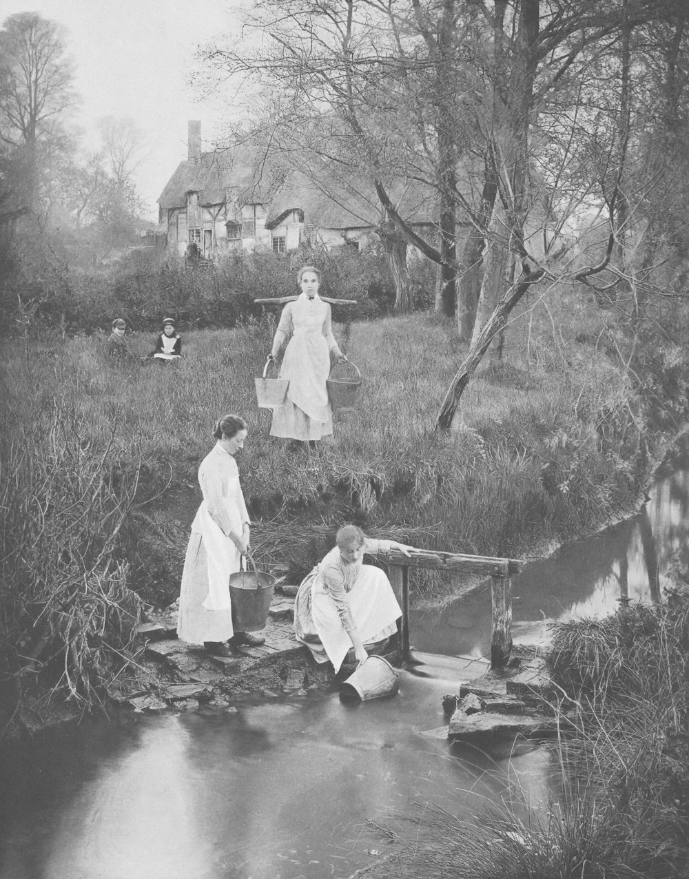 a group of people standing on top of a river