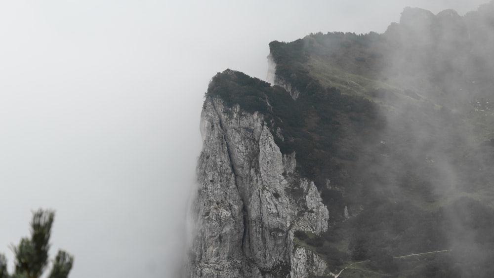 a very tall mountain with a very steep face