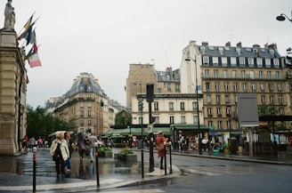 A vibrant cityscape of European landmarks with professionals walking to work
