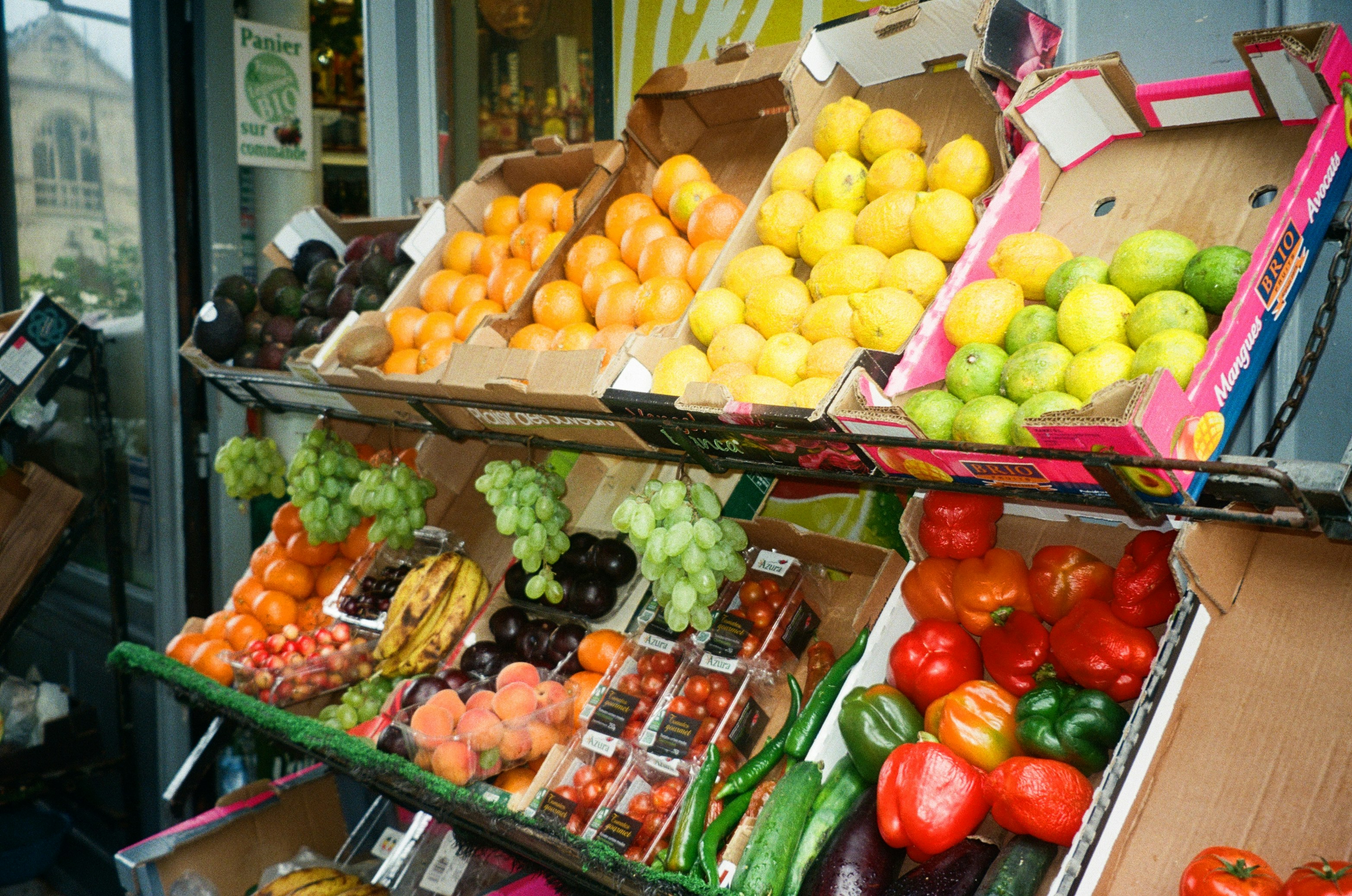 a display of fruits and vegetables in a store