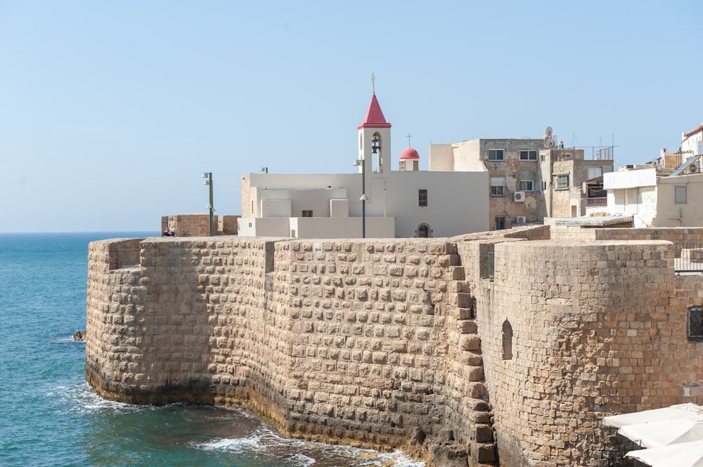 a view of a city next to the ocean