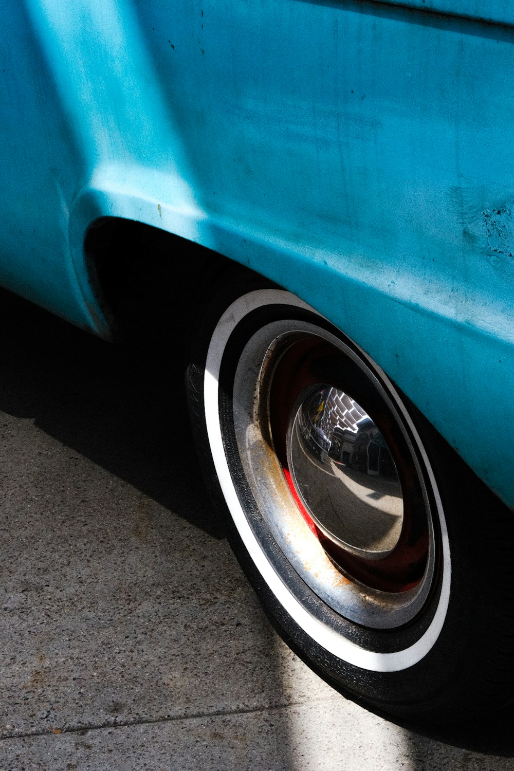 a close up of a tire on a car