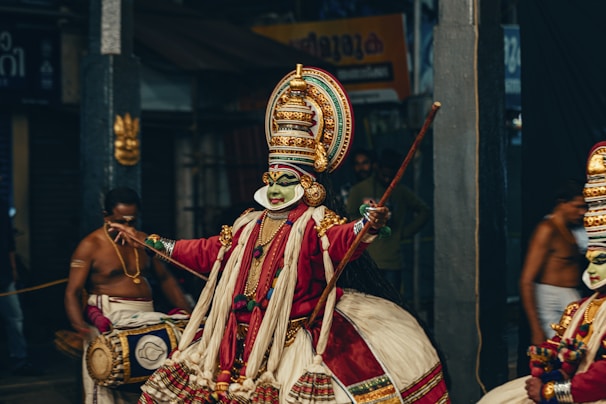 a group of people dressed in colorful costumes
