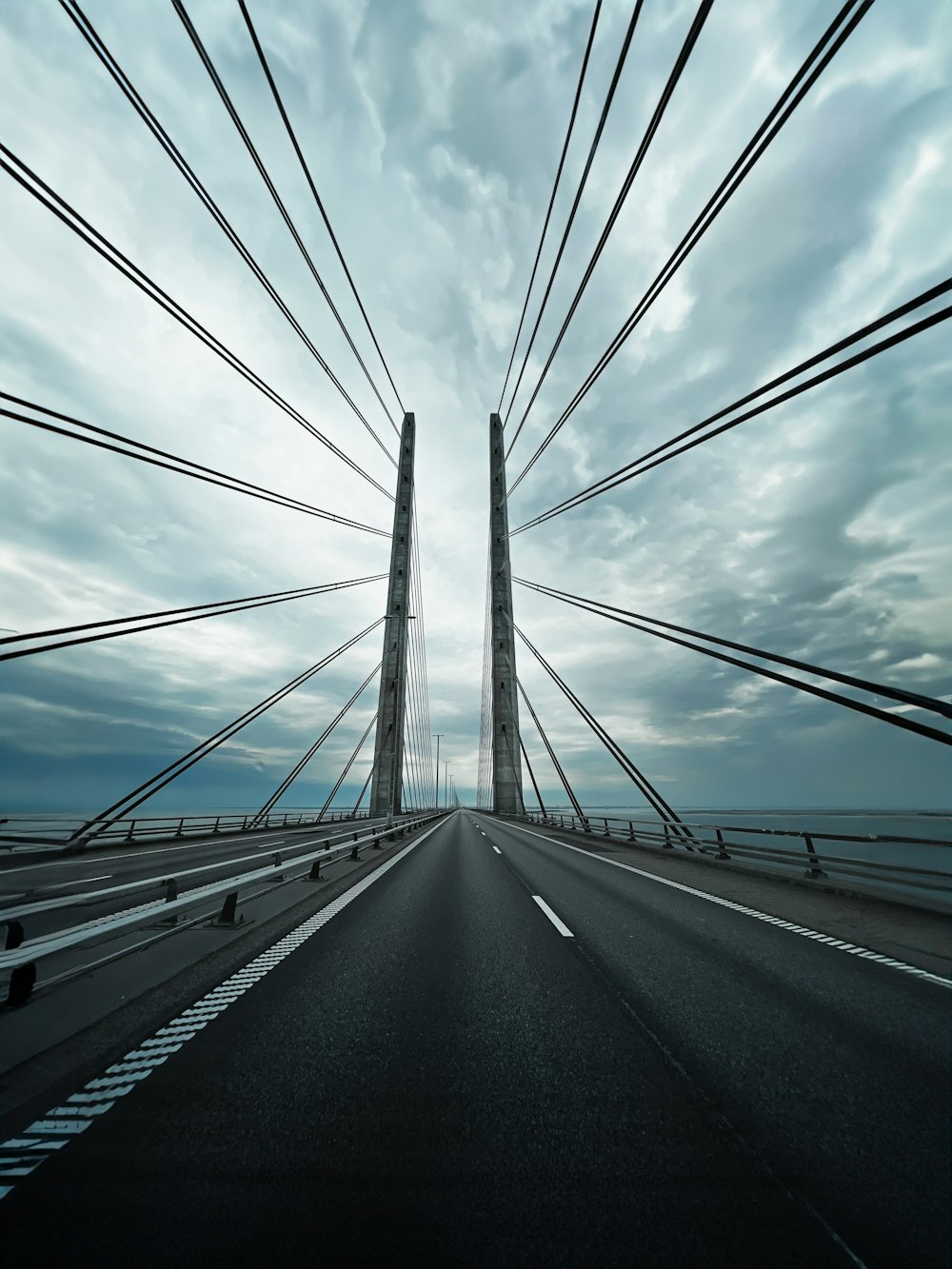 a view of a bridge from the inside of the car