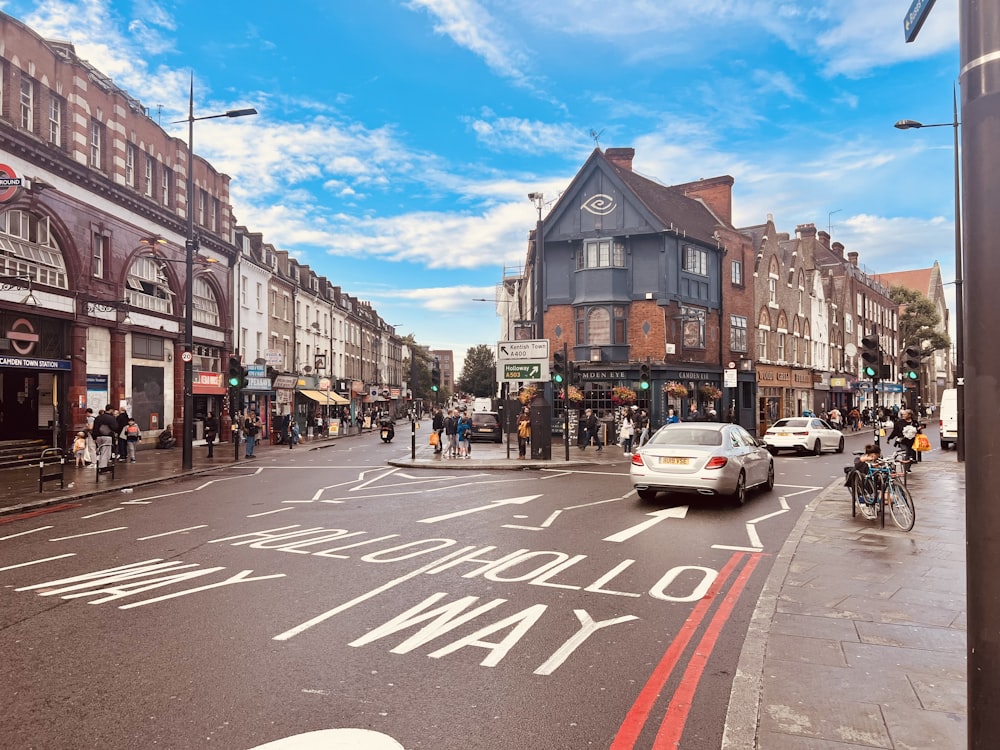 a city street with cars and people on it