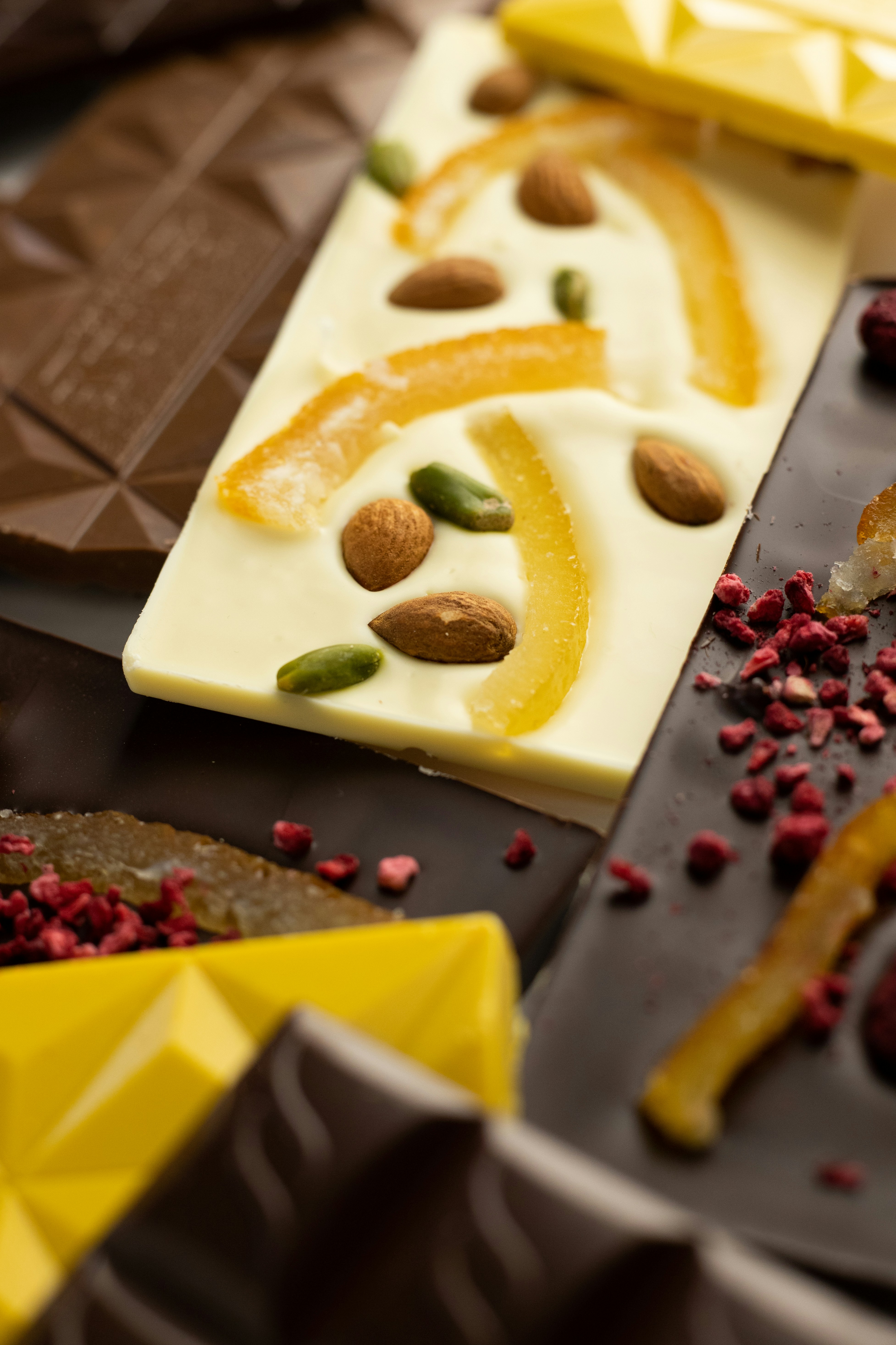 a variety of chocolates and nuts on a table