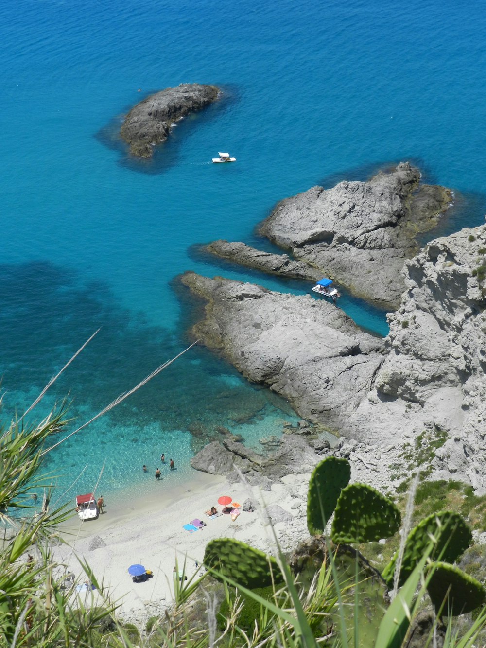 a view of a beach with people on it