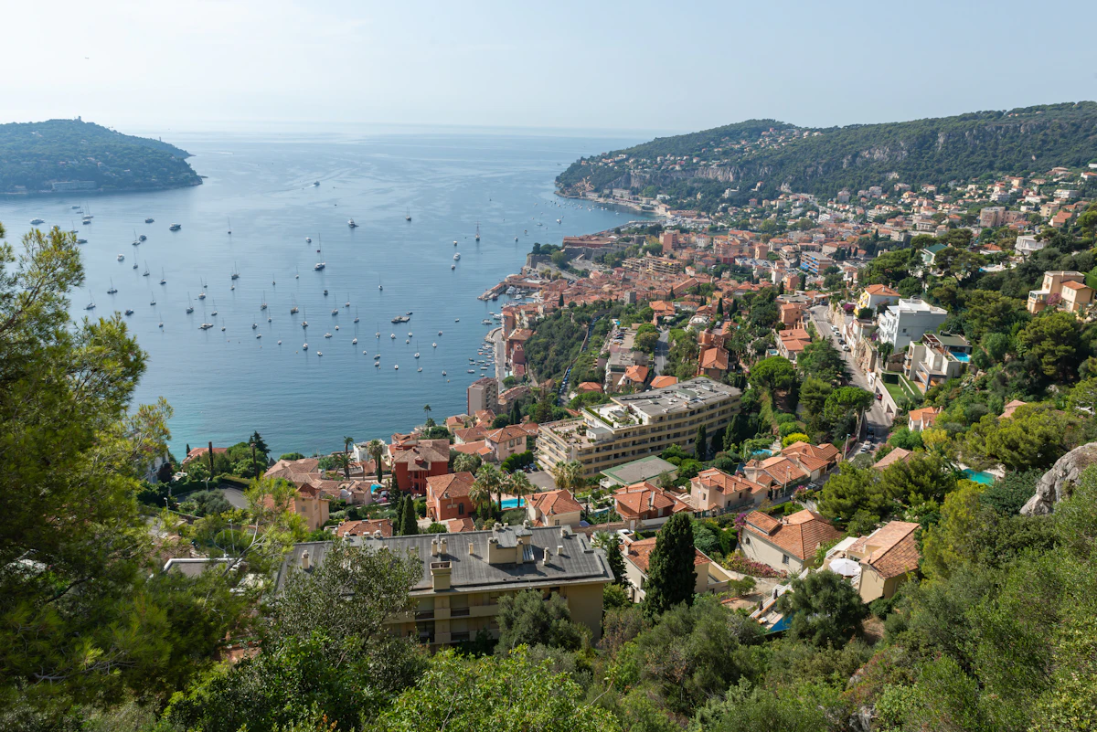 Villefranche-sur-Mer and its bay from the wooded hillside above