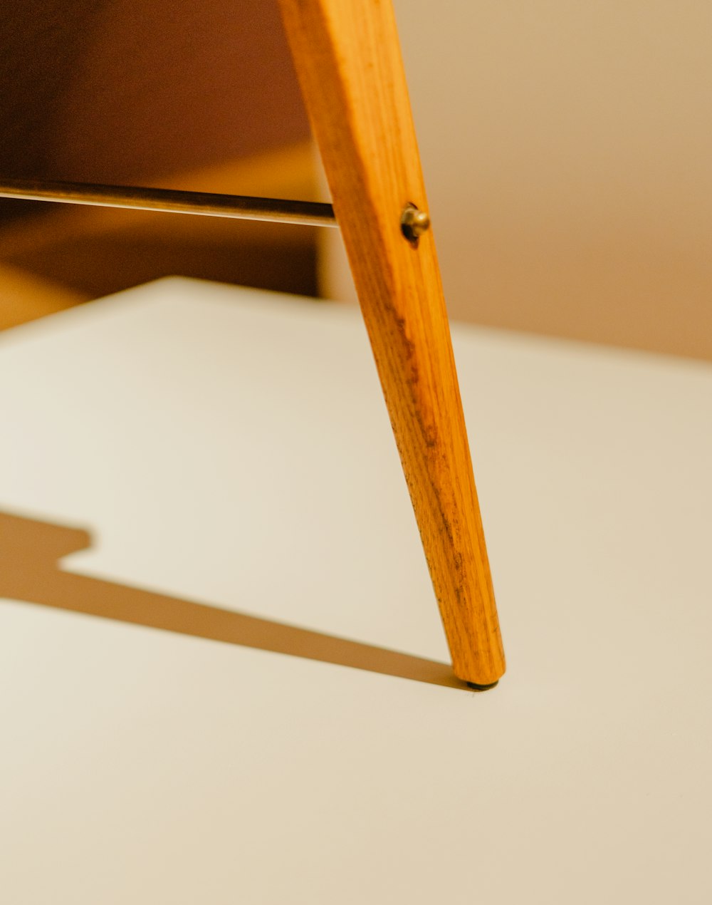 a close up of a wooden object on a table