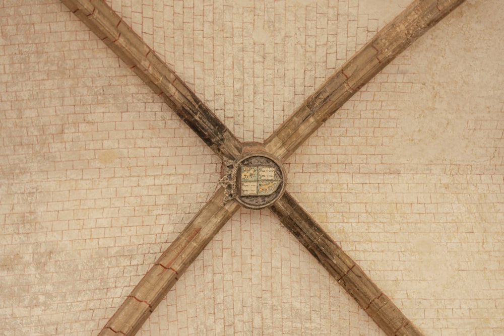 a close up of an umbrella with a clock on it