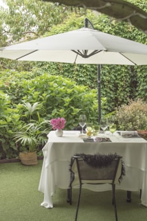 A serene outdoor space with elegant table linens.