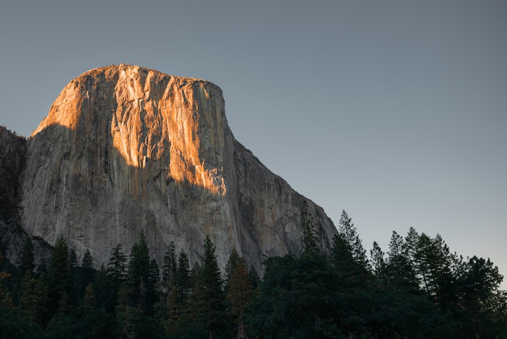 a large mountain with a very tall peak