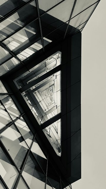 Modern corporate architecture at dusk — independent view for critical financial services programs