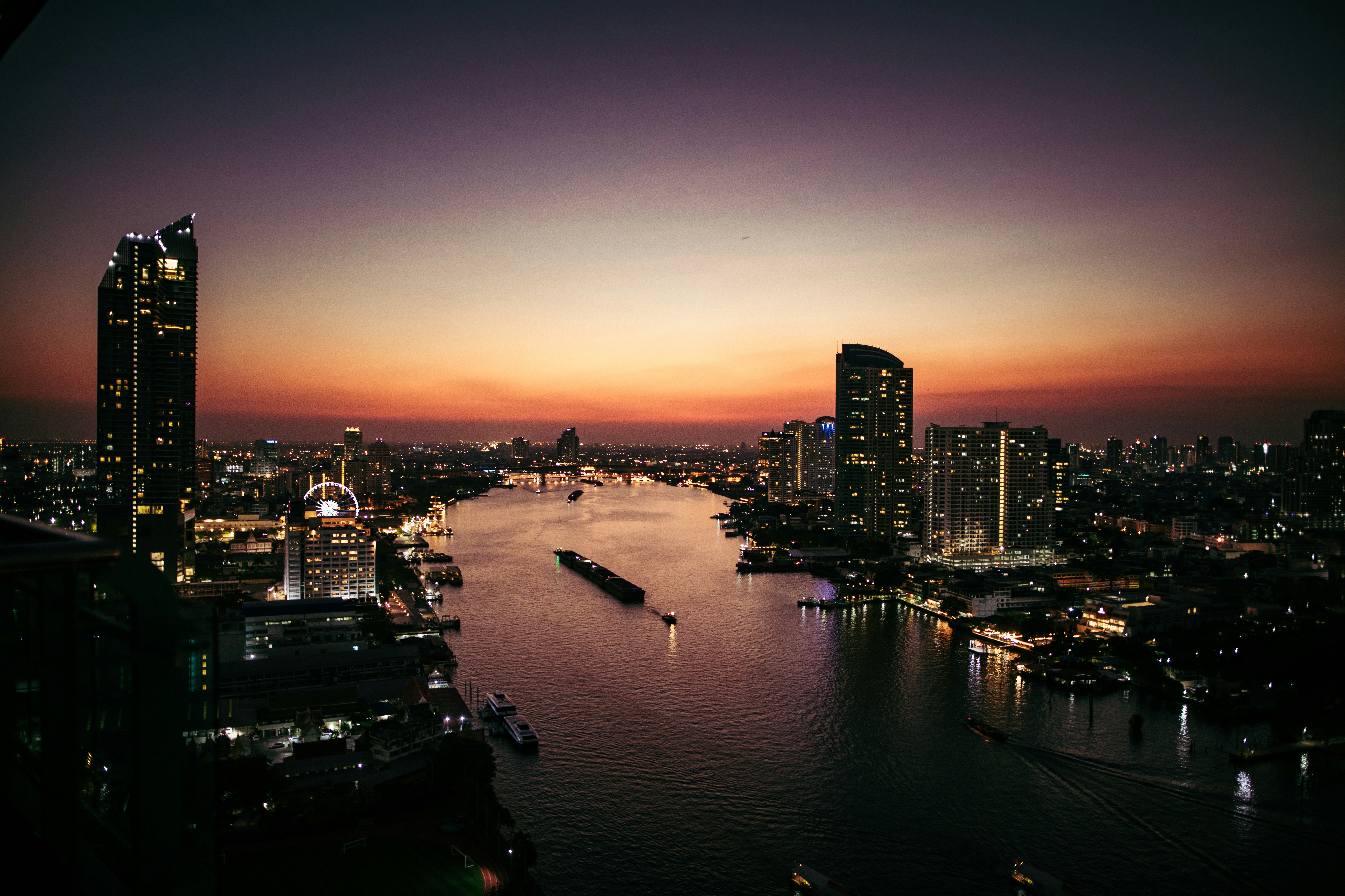 a view of a city and a river at night