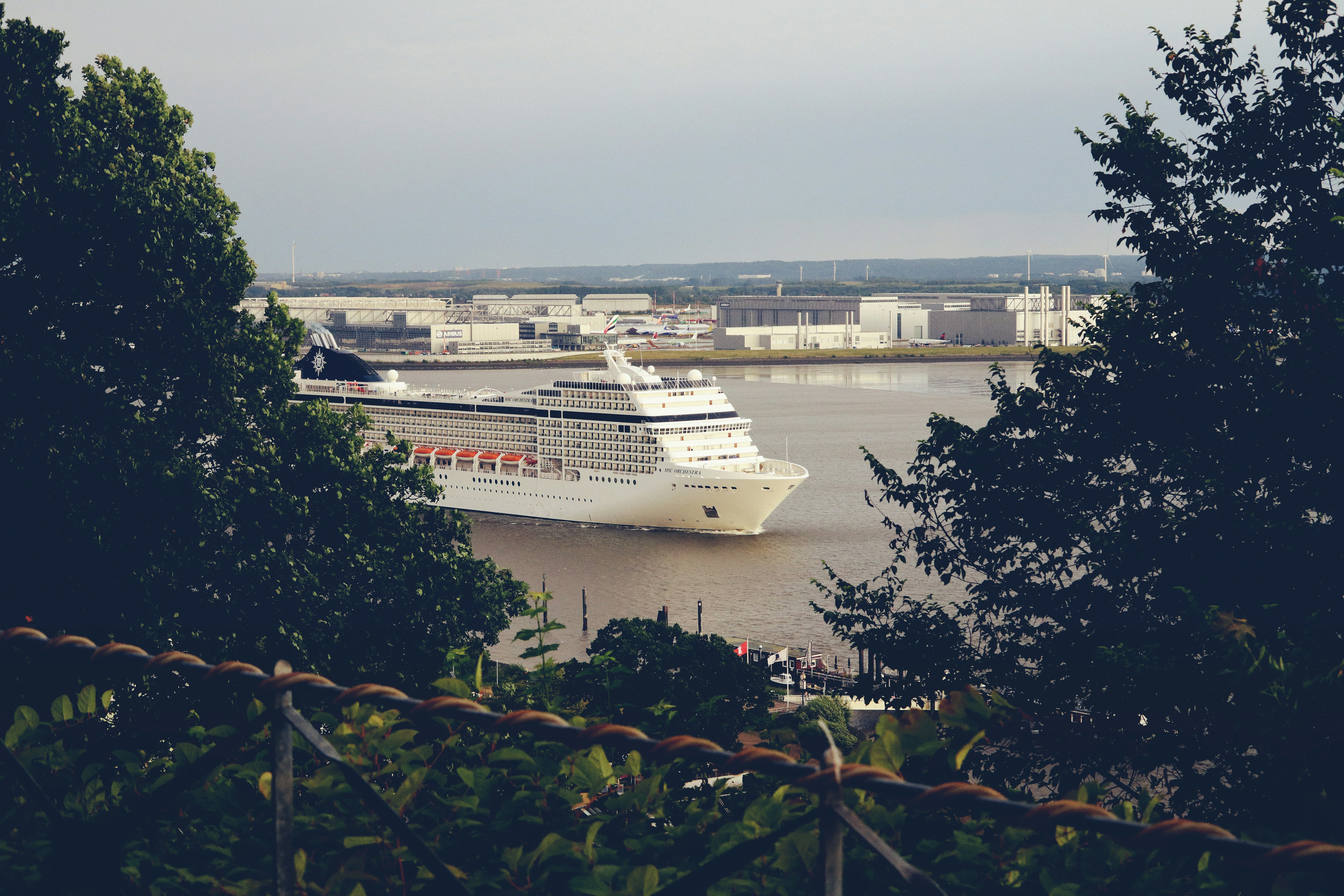 a large cruise ship in a large body of water, 