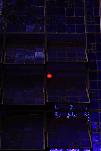 Array of smart transport components arranged on a sleek surface, illuminated by blue light.