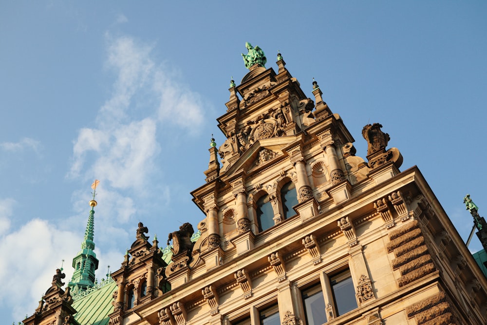 a tall building with a clock on the top of it