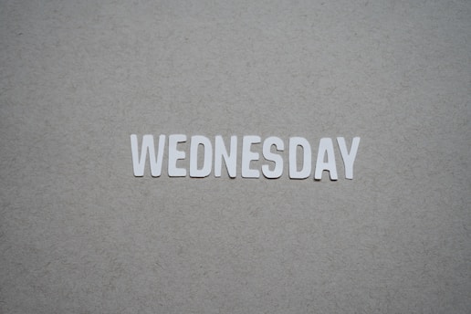 the word wednesday written in cut out letters