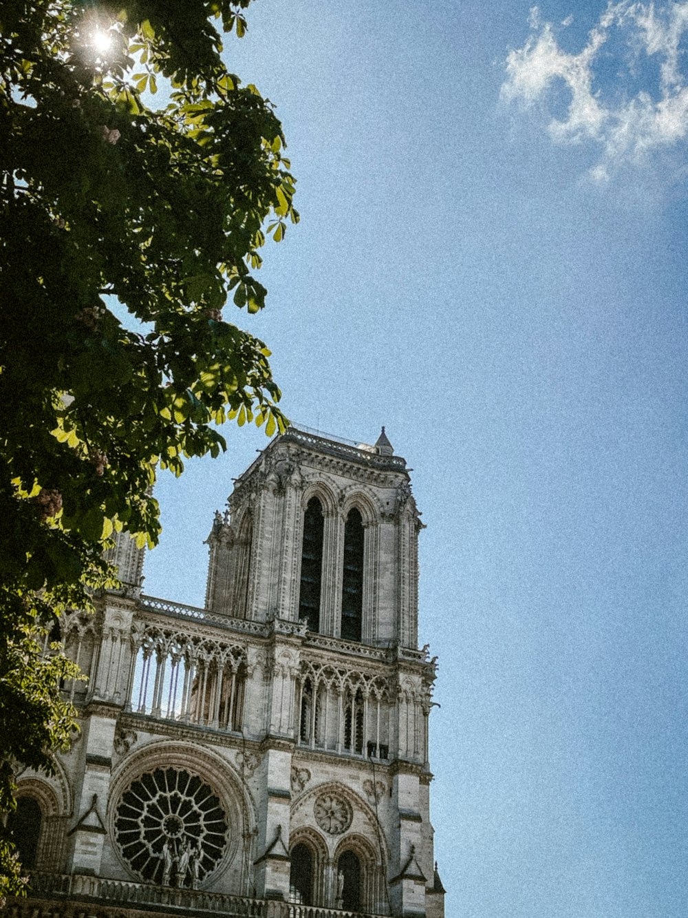 a very tall building with a clock on it's side