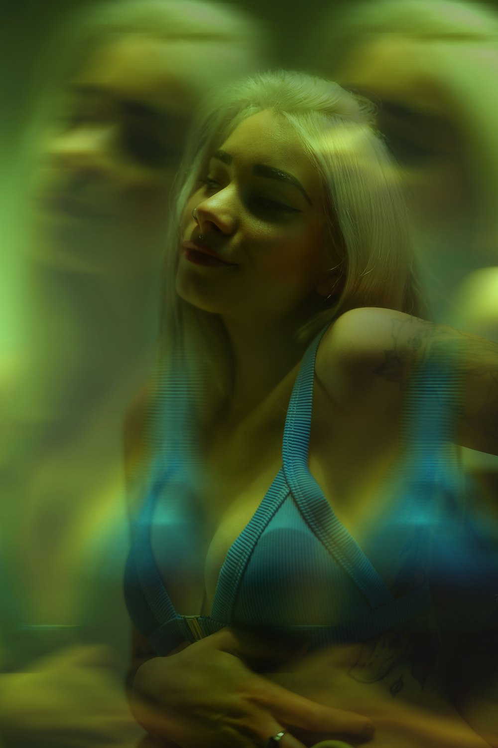 a blurry photo of a woman in a bikini