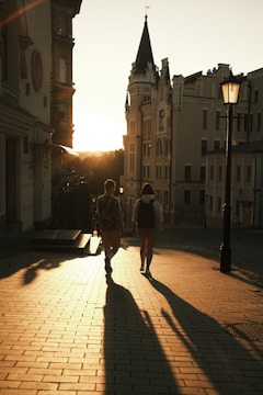 Couple walking along Qingdao’s historic German architecture street in soft afternoon light