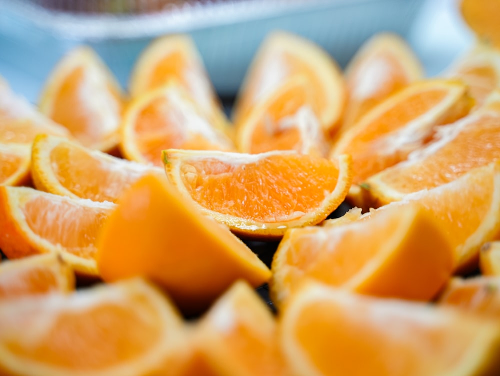 a close up of a bunch of oranges