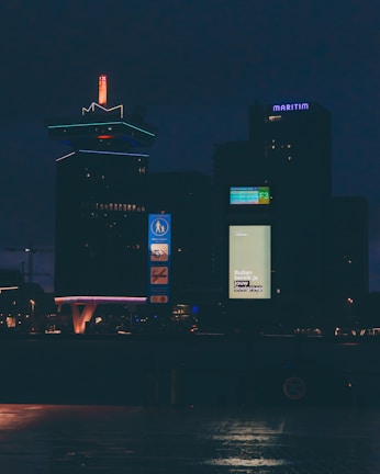 City skyline with illuminated buildings symbolizing technological progress.
