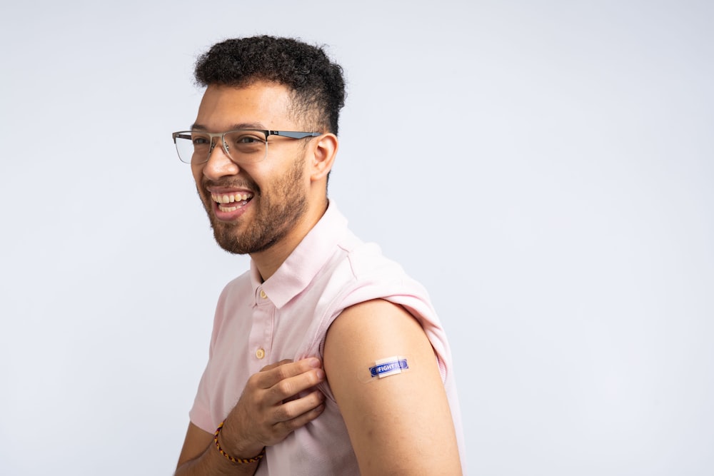 a man with a tattoo on his arm