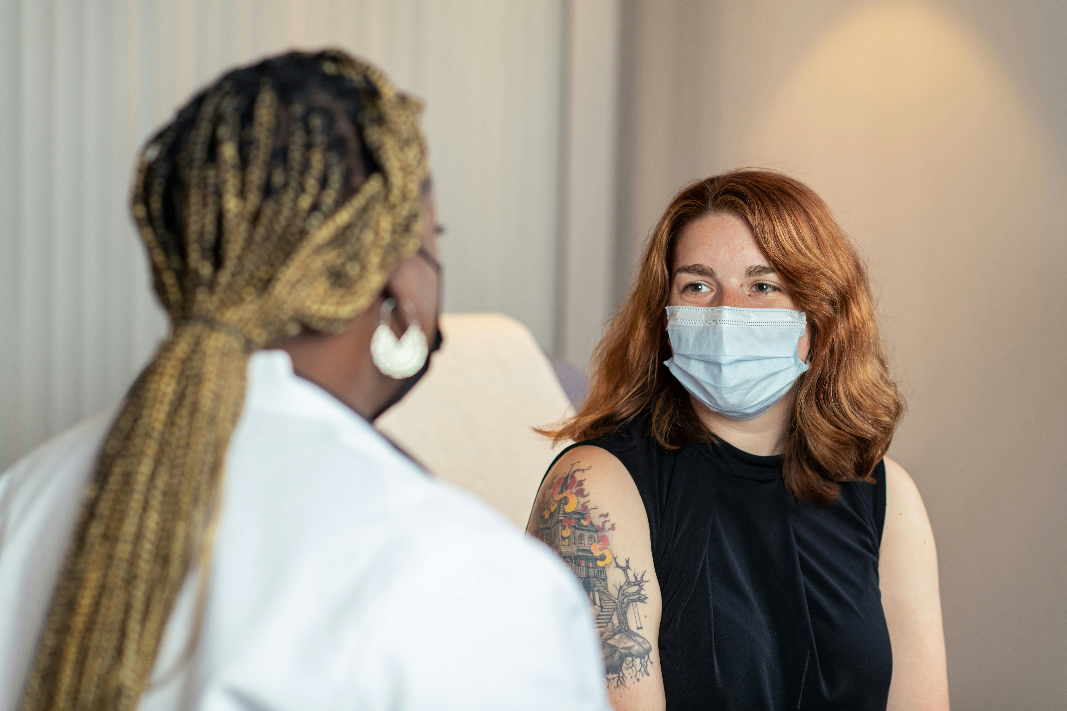 Skincare expert consulting with a client - best way to reduce pores on nose