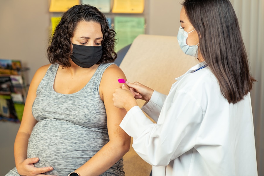 A pregnant patient receiving the whooping cough vaccine in the upper arm