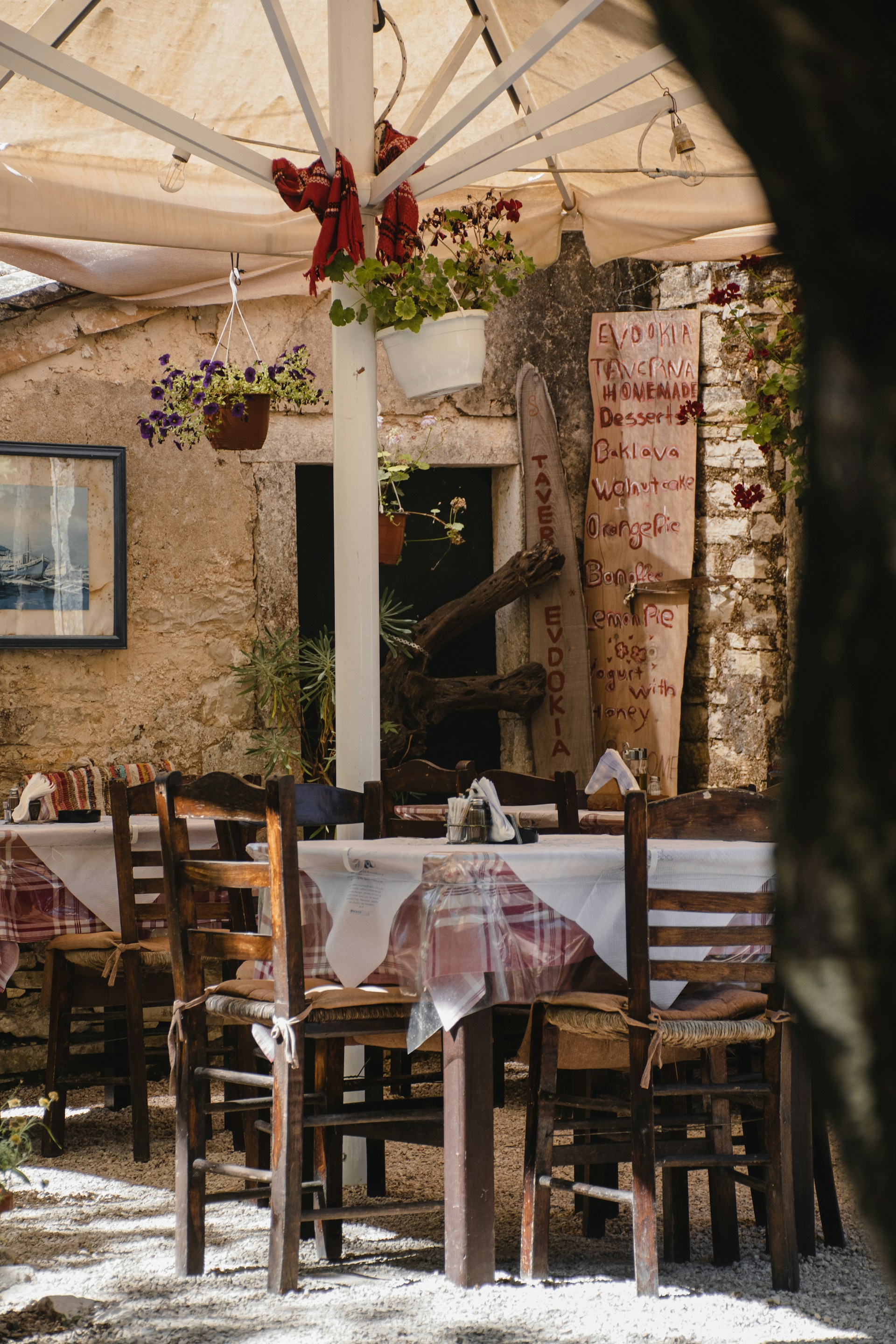 woman wearing yellow long-sleeved dress under white clouds and blue sky during daytime