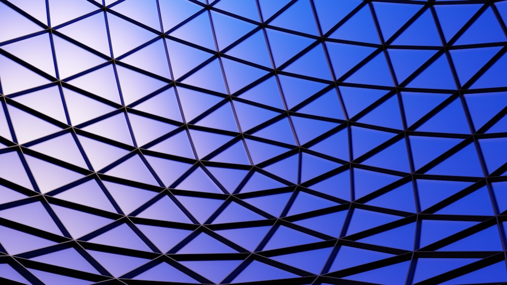 a close up of a building with a blue sky in the background