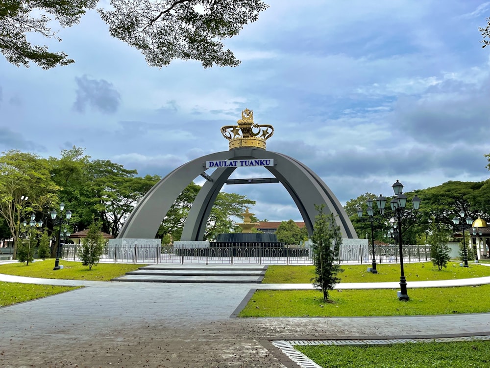 a large arch with a crown on top of it