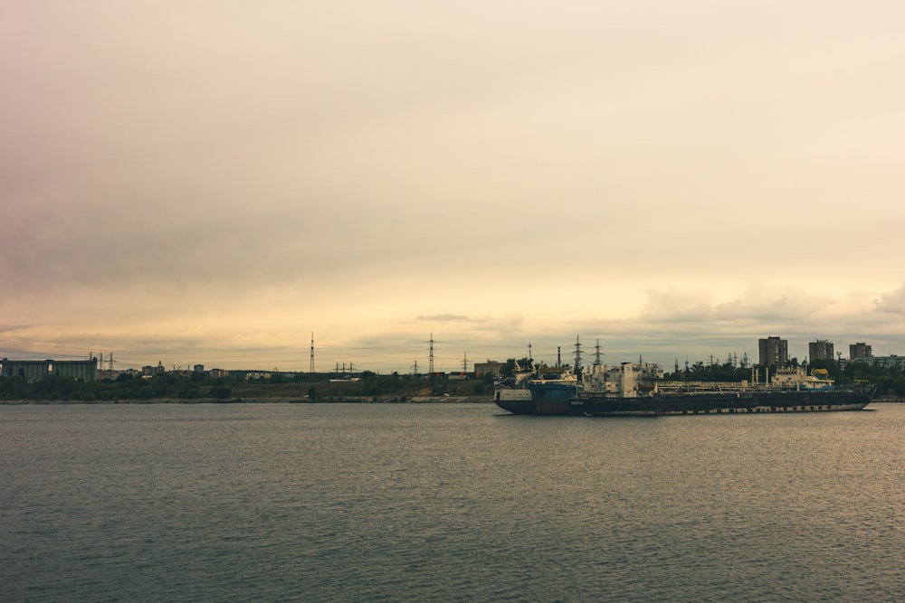 a large boat floating on top of a large body of water