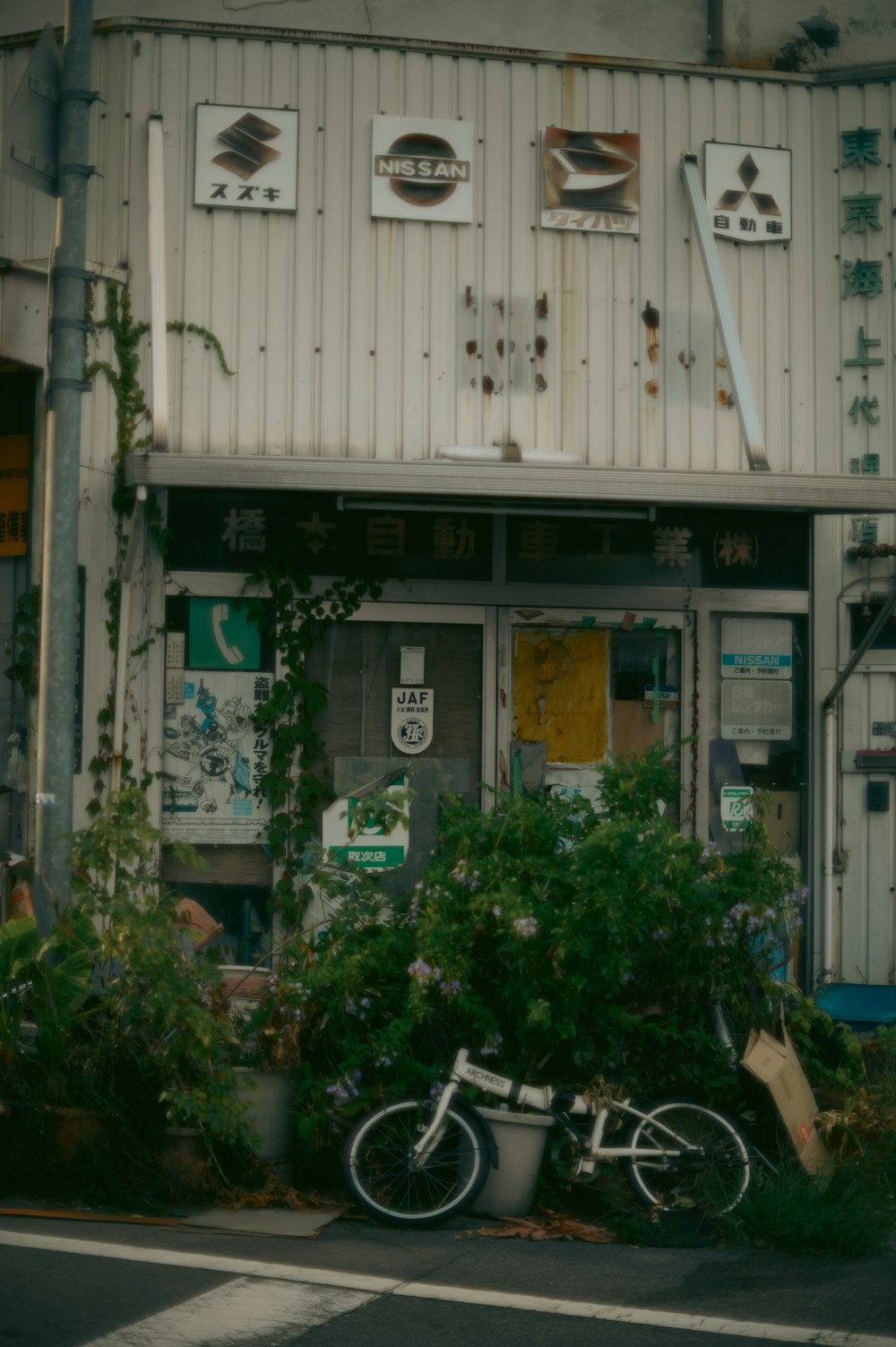 a bicycle parked in front of a building